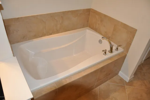 a bathroom with a bathtub