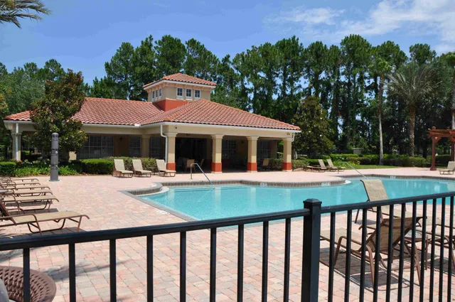 a view of house with outdoor space area and furniture