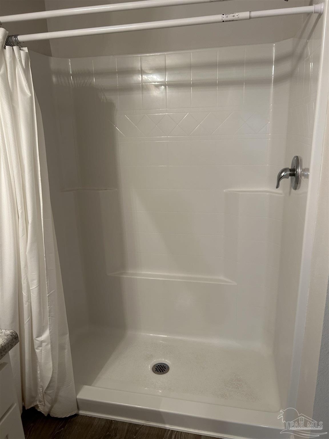 5351 Peach Drive Pace, FL 32571 - Photo 11 of 24 a bathroom with a shower