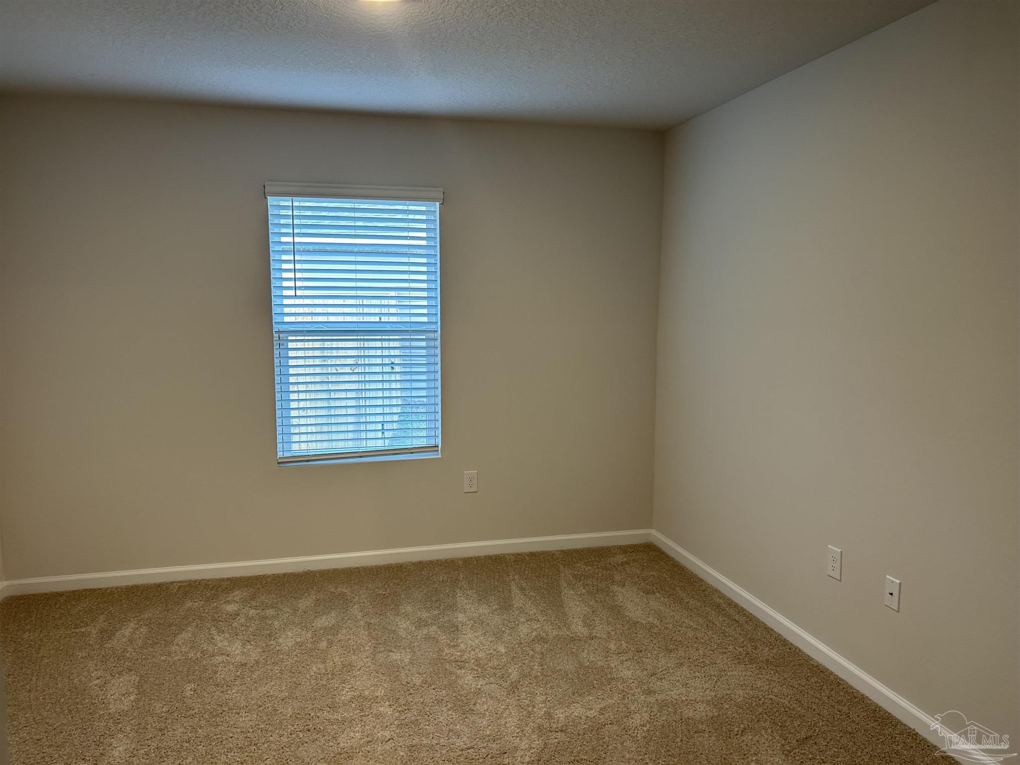 5351 Peach Drive Pace, FL 32571 - Photo 16 of 24 a view of an empty room with a window