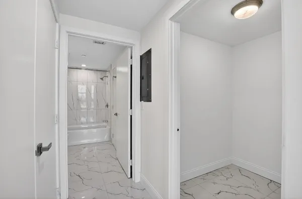 a view of a kitchen with washer and dryer