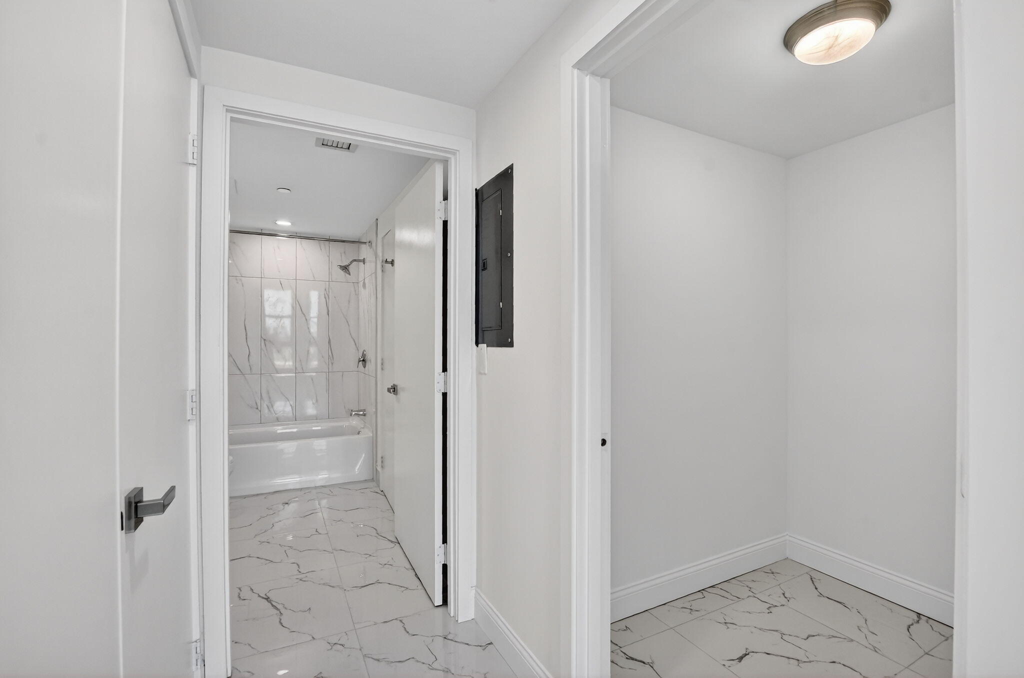 350 West Hidden Valley Boulevard, Unit 201 Boca Raton, FL 33487 - Photo 20 of 33 a bathroom with a shower