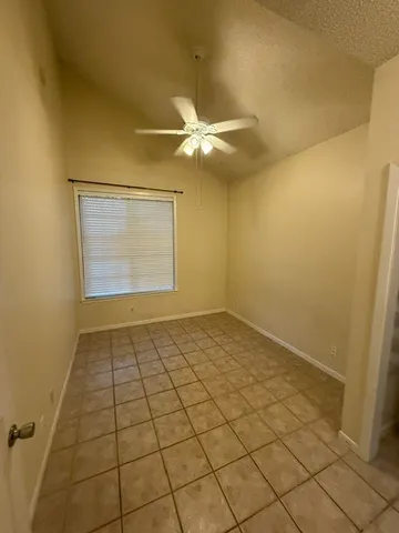 en empty room with windows