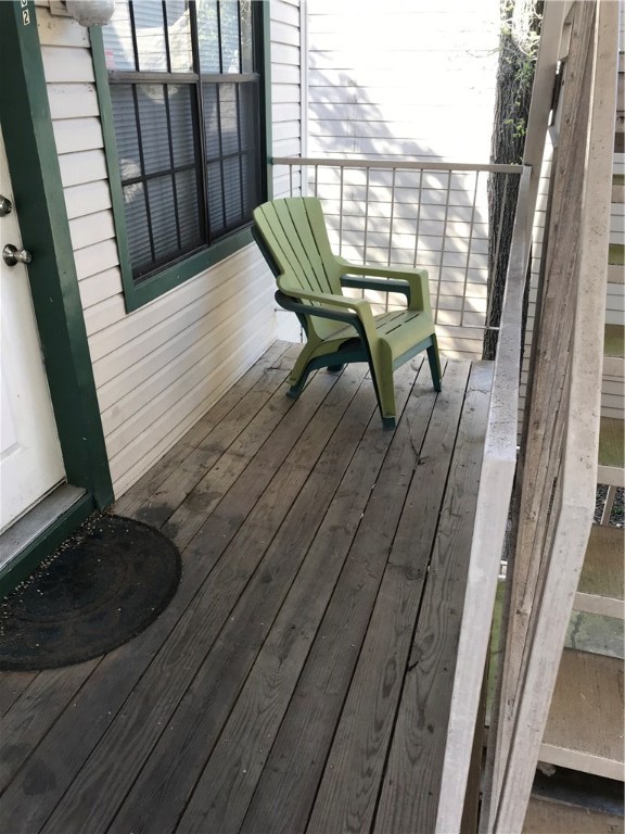 2300 Leon Street, Unit 202 Austin, TX 78705 - Photo 19 of 19 a balcony with table and chairs