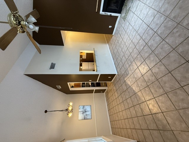 2300 Leon Street, Unit 202 Austin, TX 78705 - Photo 9 of 19 a bedroom with a bed and a chandelier