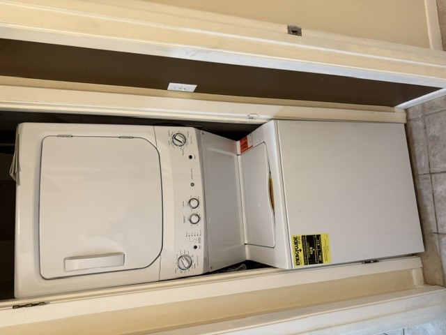 2300 Leon Street, Unit 202 Austin, TX 78705 - Photo 10 of 19 a utility room with dryer and washer
