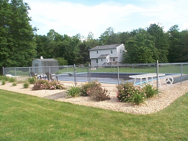 2344 Lyndhurst Road Waynesboro, VA 22980 - Photo 23 of 25 a view of a house with backyard and a sitting area