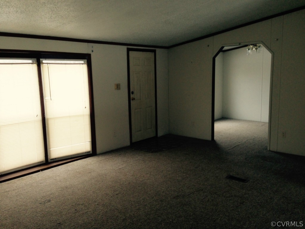 4242 Falls Road Victoria, VA 23974 - Photo 3 of 5 a view of empty room with floor to ceiling window