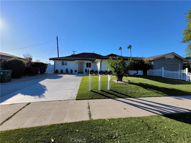 a view of a house with a big yard
