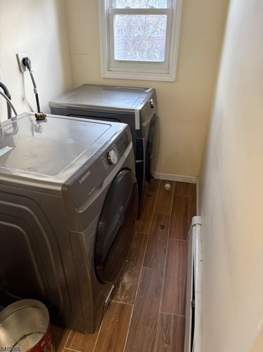 30 Elm Street, Unit 2 Newark, NJ 07102 - Photo 9 of 10 a utility room with dryer and washer