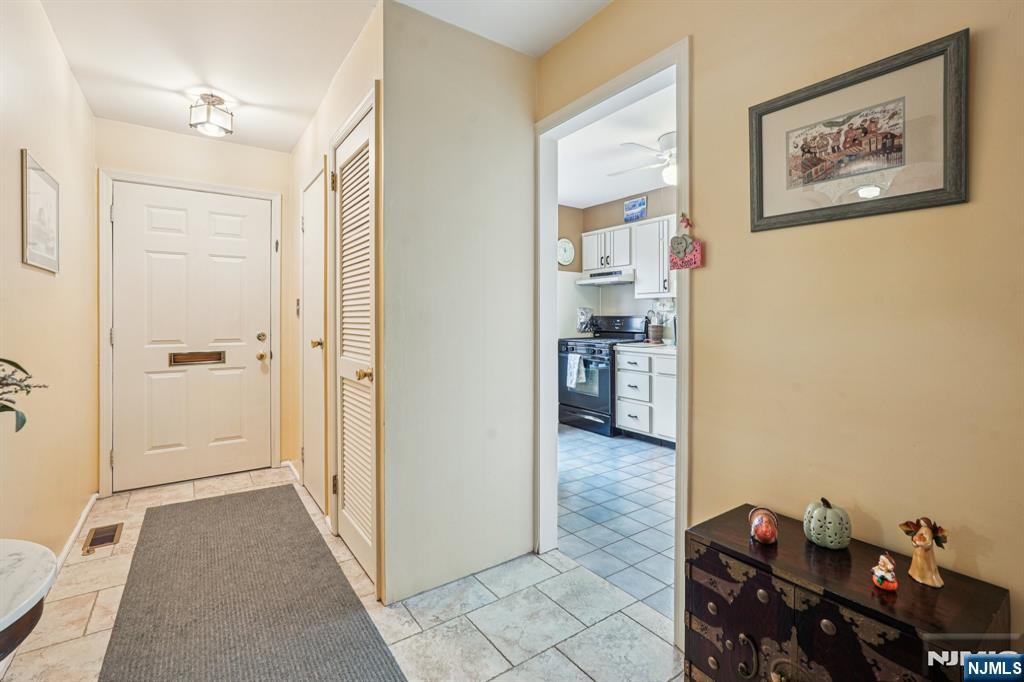 181 Long Hill Road, Unit K5 Little Falls, NJ 07424 - Photo 13 of 48 a view of a hallway with workspace and a window