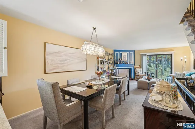 a view of a a dining room with furniture