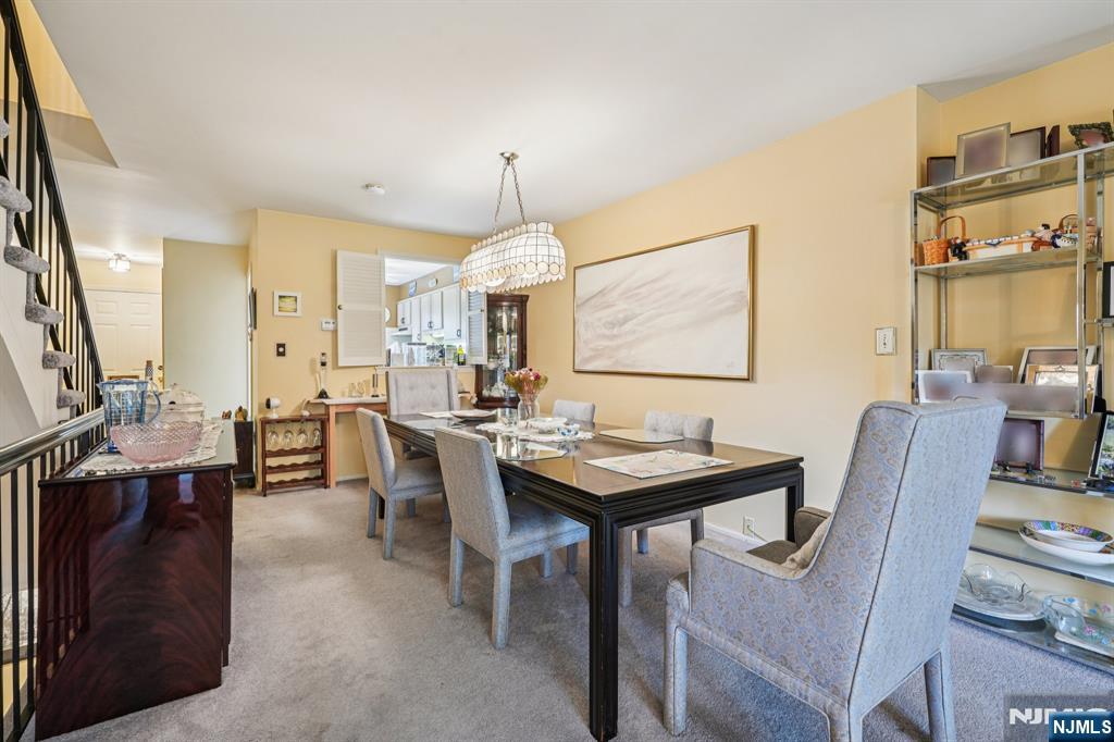 181 Long Hill Road, Unit K5 Little Falls, NJ 07424 - Photo 7 of 48 a view of a a dining room with furniture