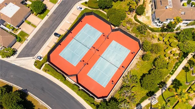 swimming pool with outdoor seating and yard