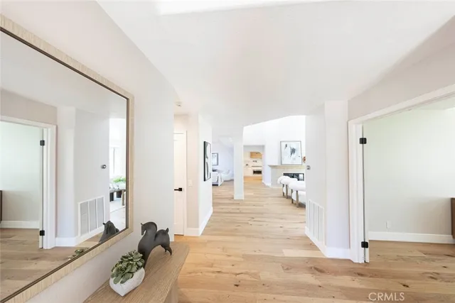a view of a living room and dining room