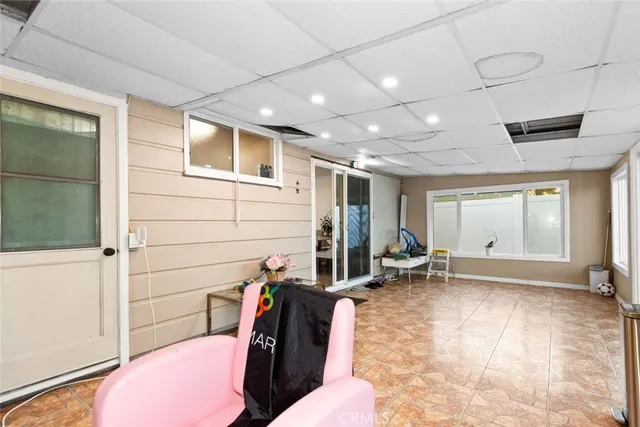 a bathroom with a sink a mirror and shower
