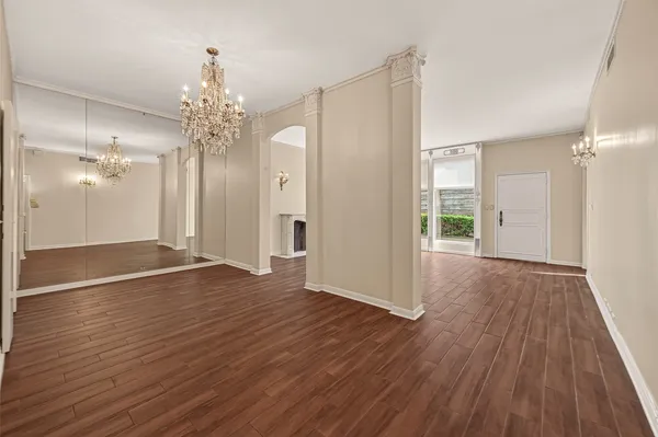 a view of an entryway with a floor to ceiling window