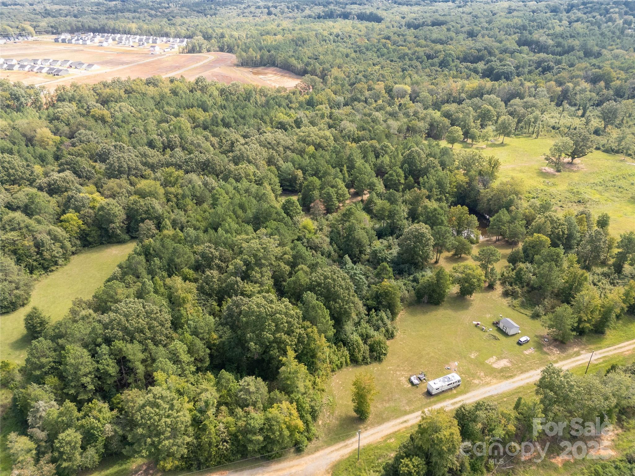 0 Mary Cauthen Farm Road Lancaster, SC 29720 - Photo 4 of 12 a view of a lake from a yard