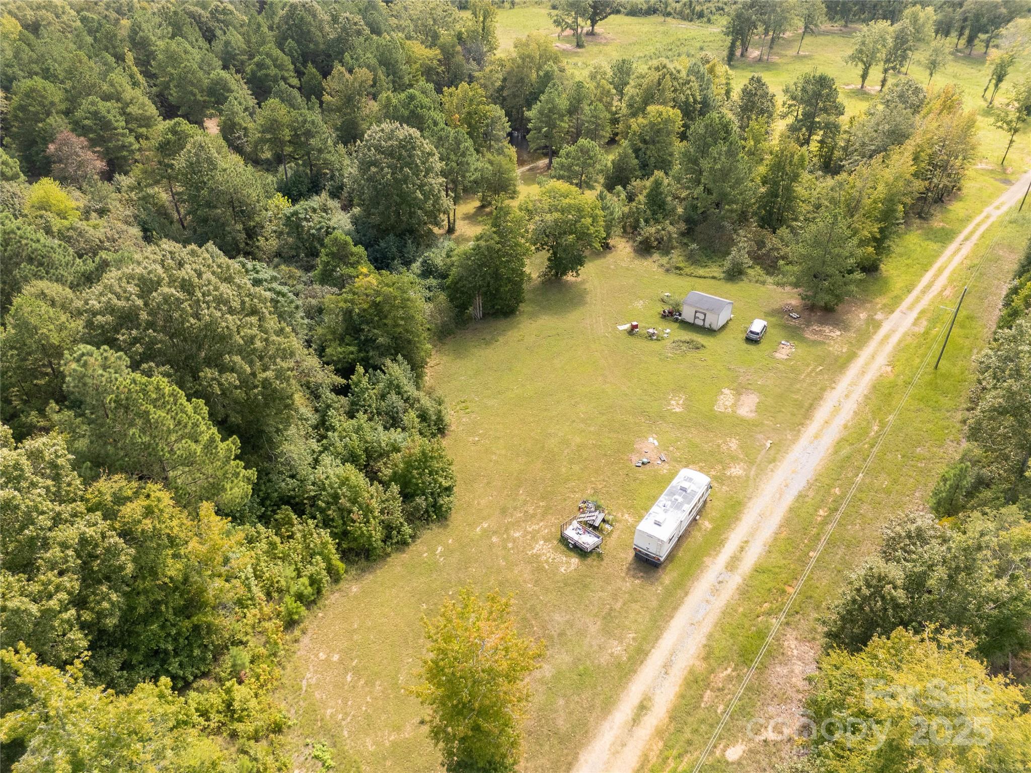 0 Mary Cauthen Farm Road Lancaster, SC 29720 - Photo 8 of 12 a view of a lake in a forest