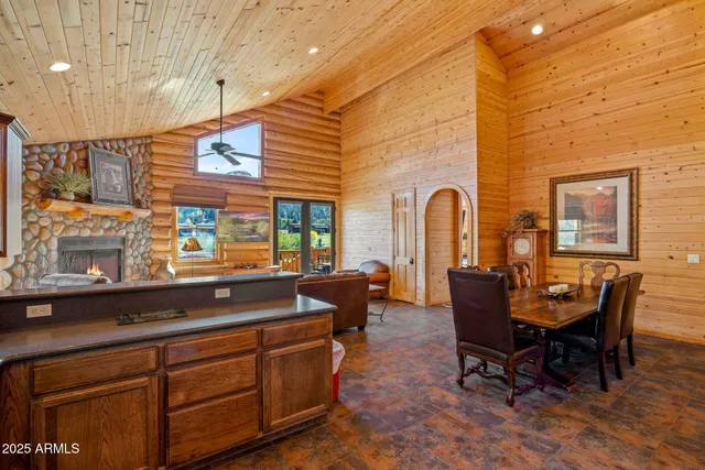 a kitchen with stainless steel appliances a sink a stove and a refrigerator