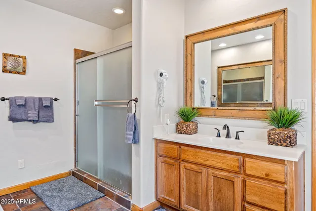 a view of a bathroom with a tub and window