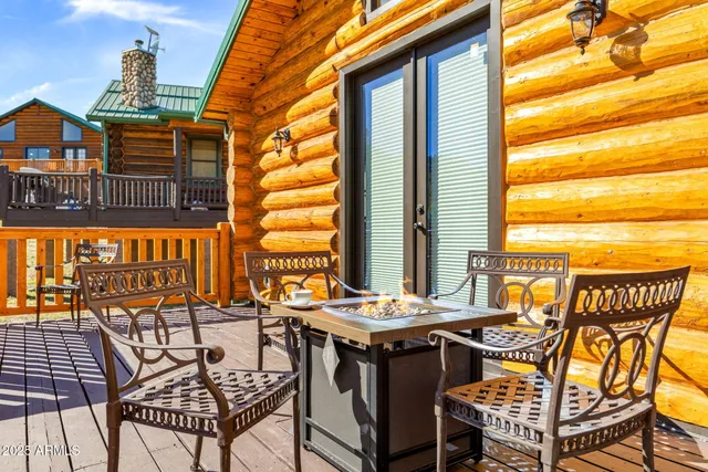 a view of a balcony with an outdoor seating