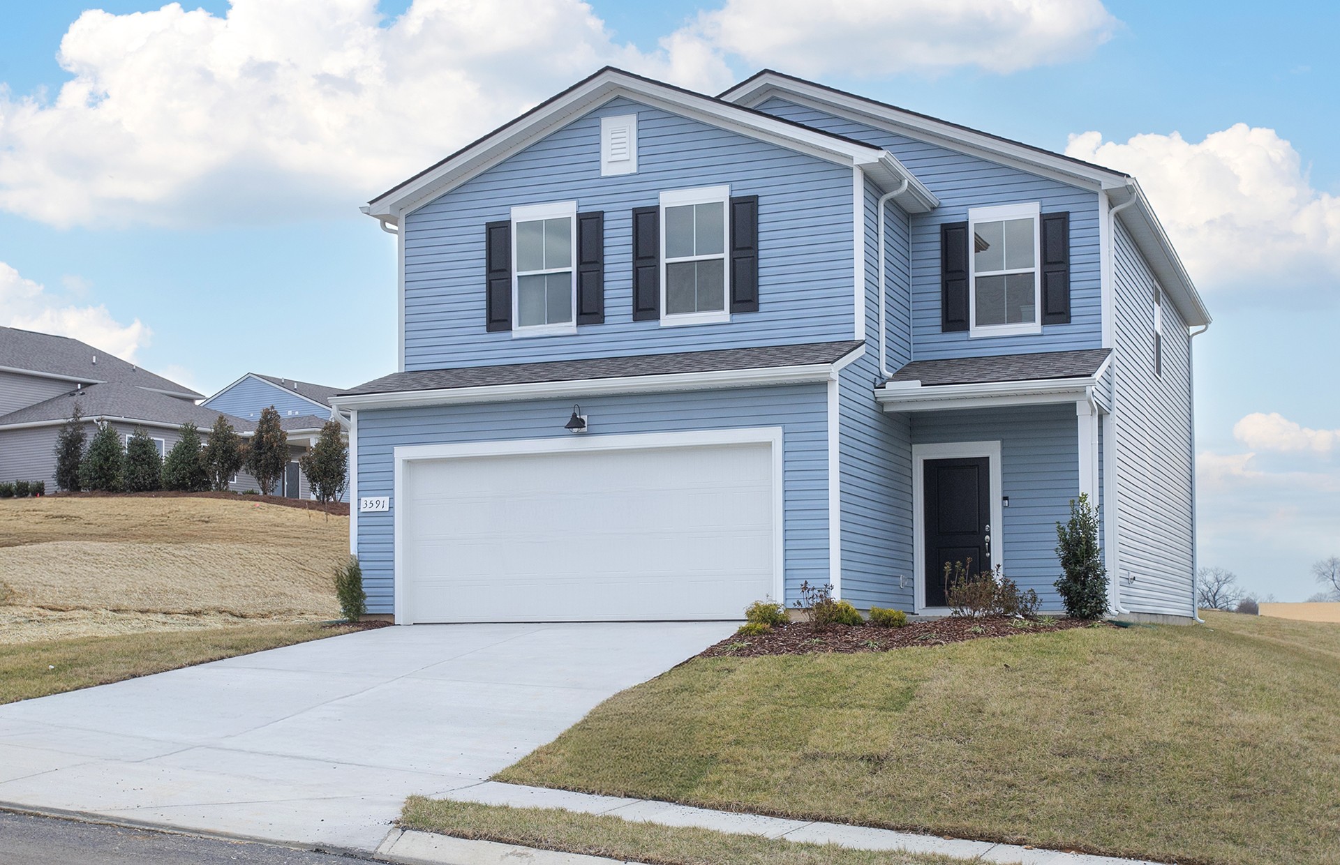 3591 Fellowship Road Columbia, TN 38401 - Photo 1 of 38 a front view of a house with a yard and garage