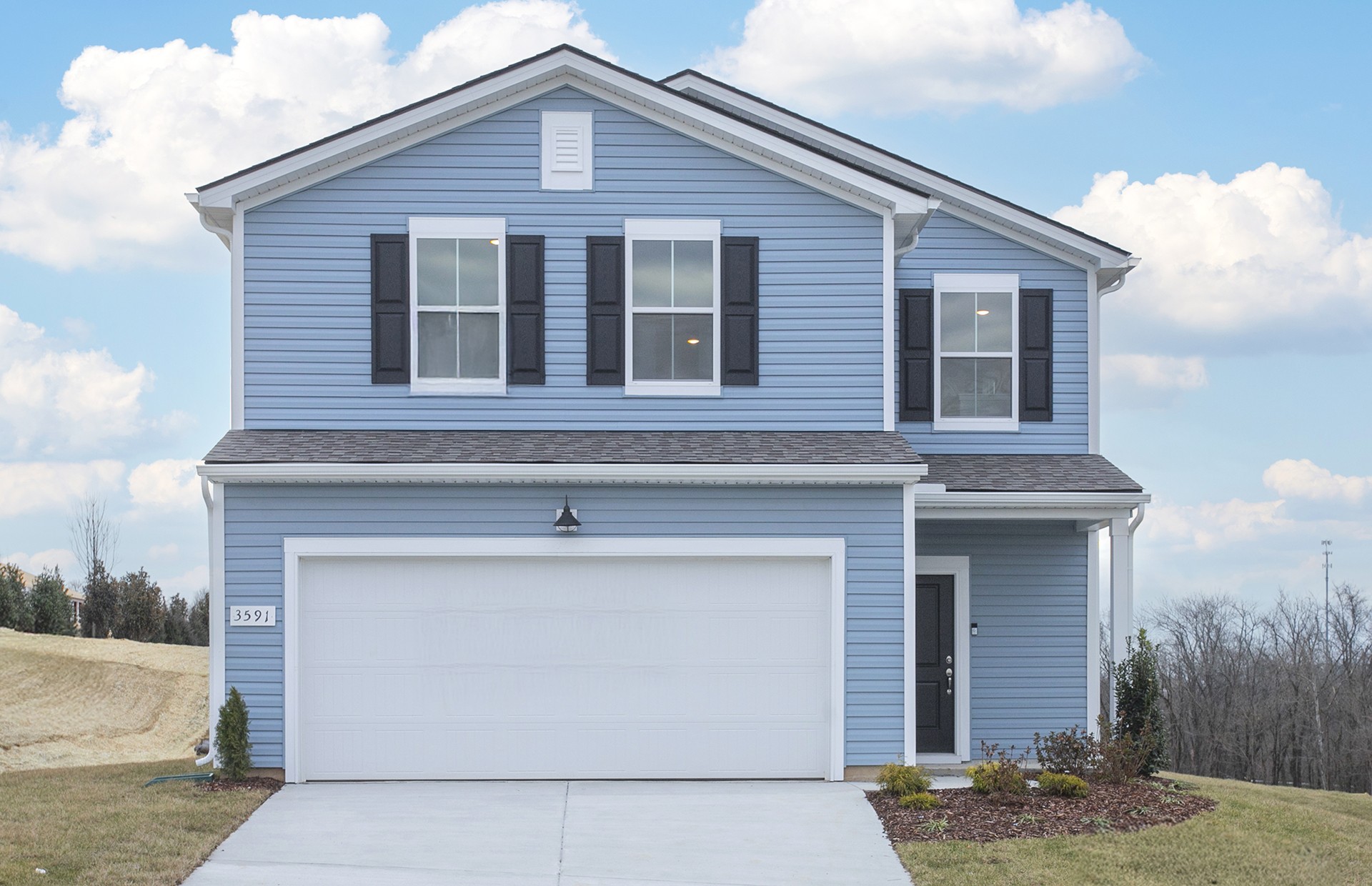 3591 Fellowship Road Columbia, TN 38401 - Photo 2 of 38 a front view of a house with garage