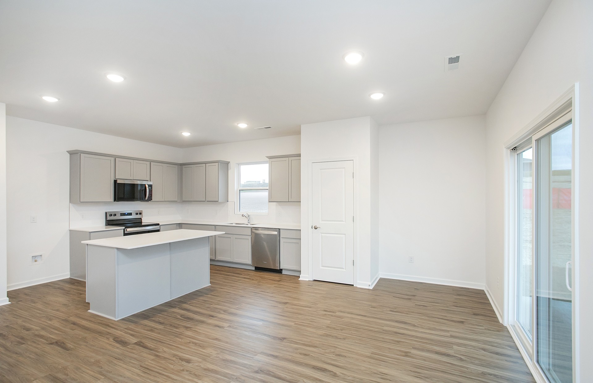 3591 Fellowship Road Columbia, TN 38401 - Photo 8 of 38 a kitchen with stainless steel appliances granite countertop a sink stove and refrigerator