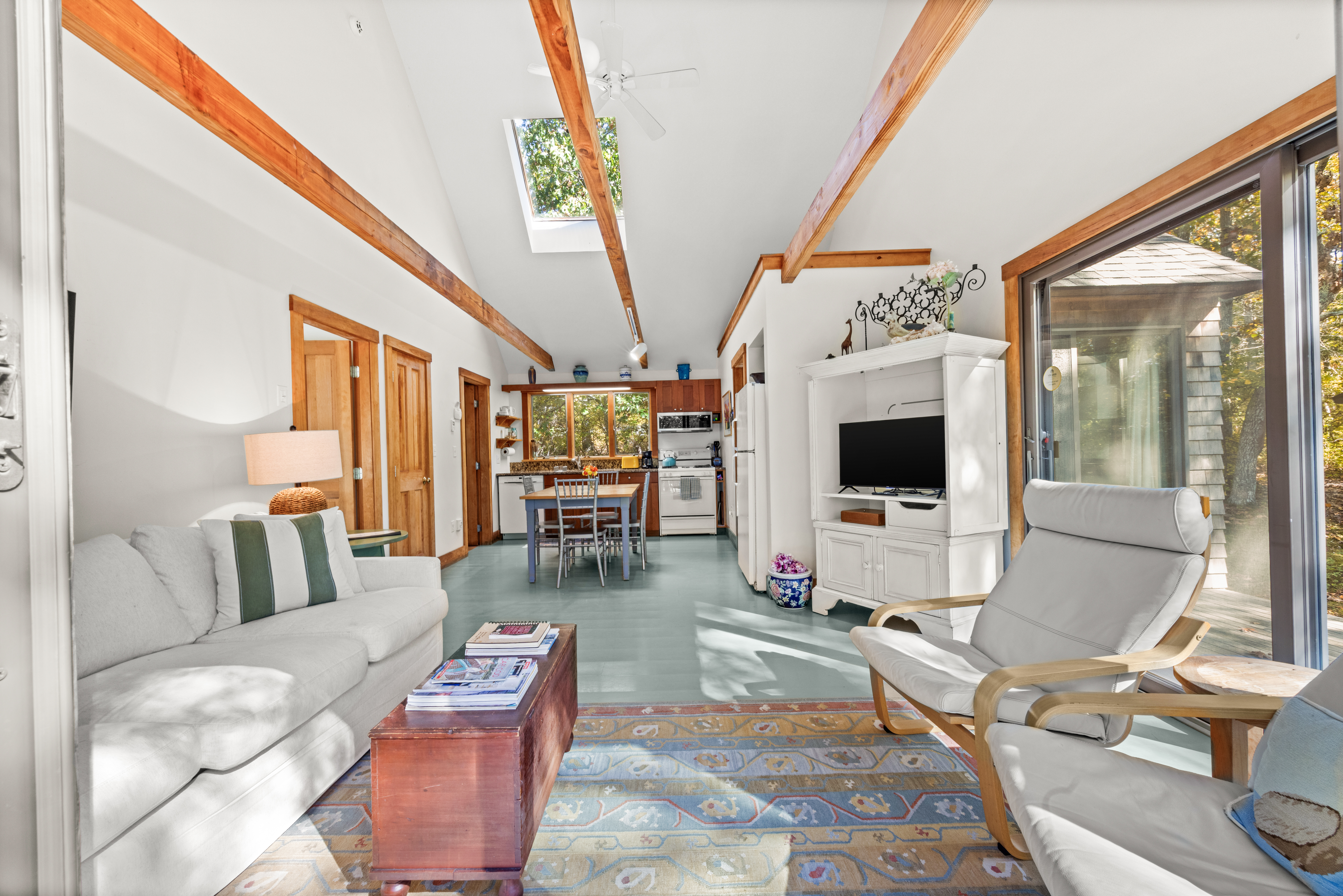 46 Tiercel Lane Chilmark, MA 02535 - Photo 2 of 20 a living room with furniture and a flat screen tv