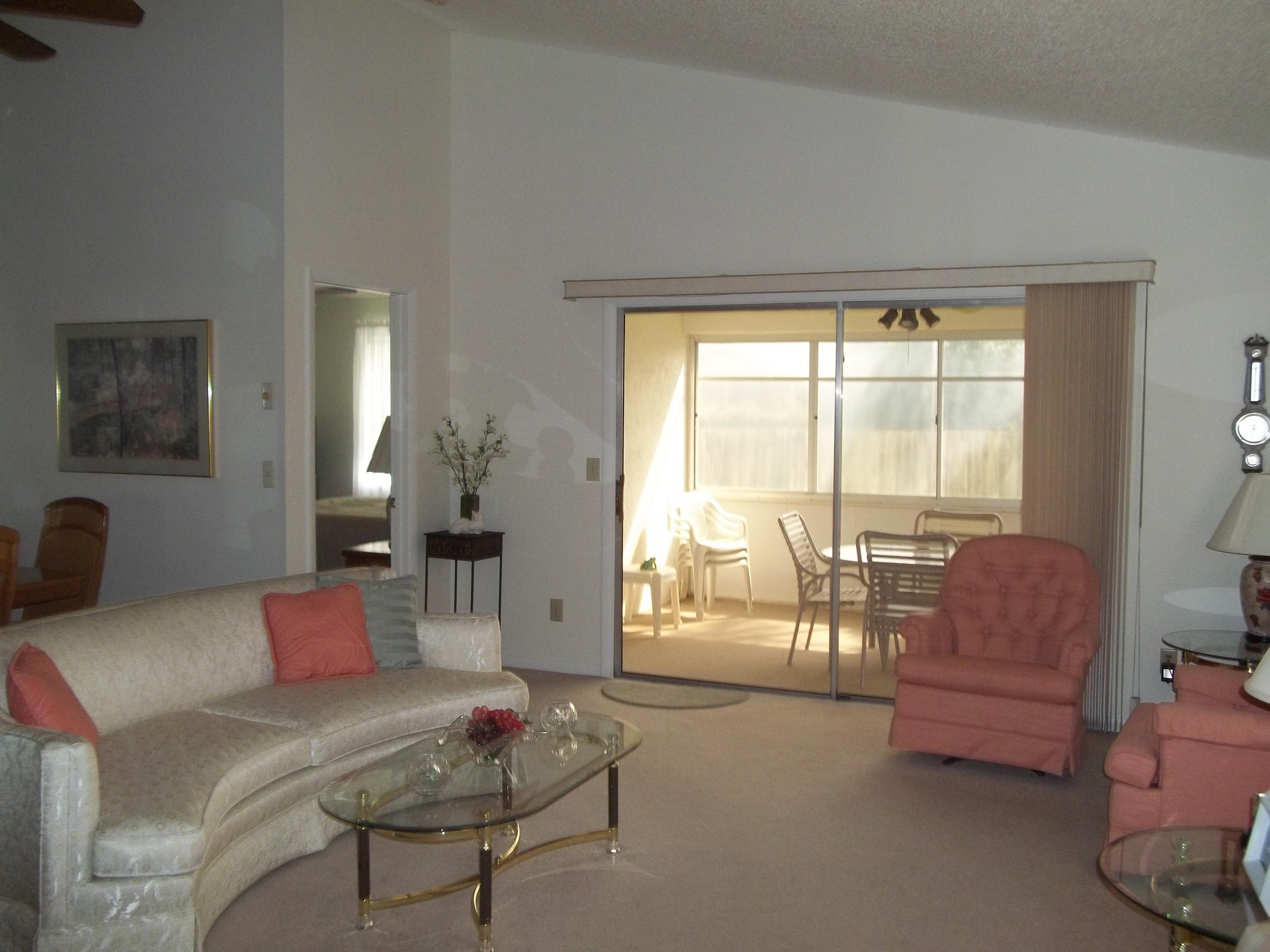 191 Raintree Trail Jupiter, FL 33458 - Photo 14 of 24 Living Room Slider to Patio