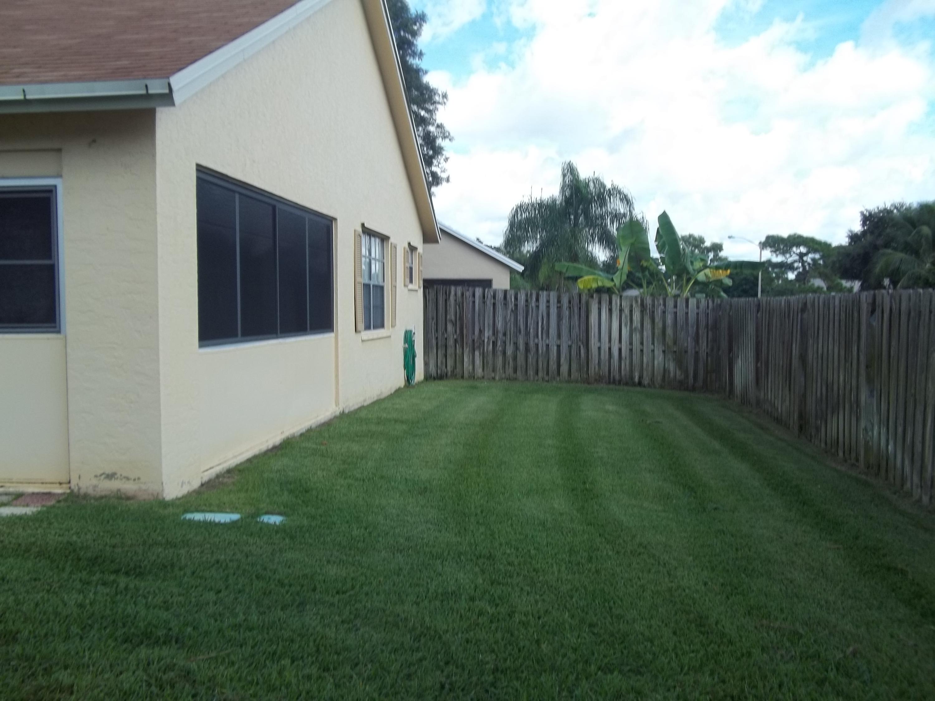 191 Raintree Trail Jupiter, FL 33458 - Photo 18 of 24 Backyard Area