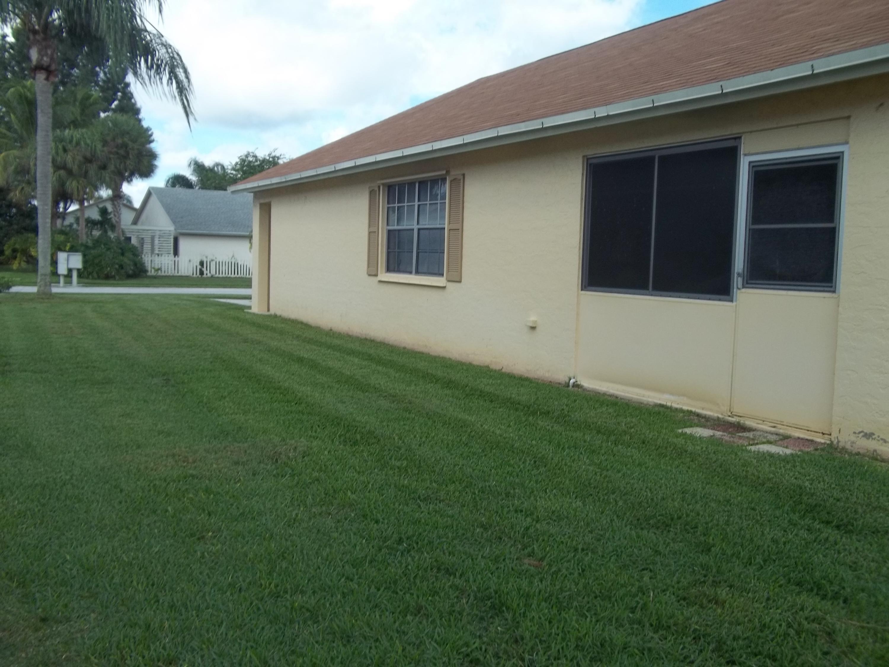 191 Raintree Trail Jupiter, FL 33458 - Photo 19 of 24 Side Yard area