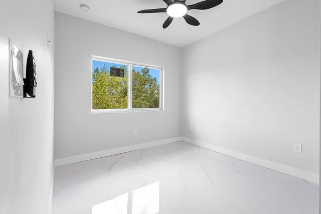 an empty room with windows