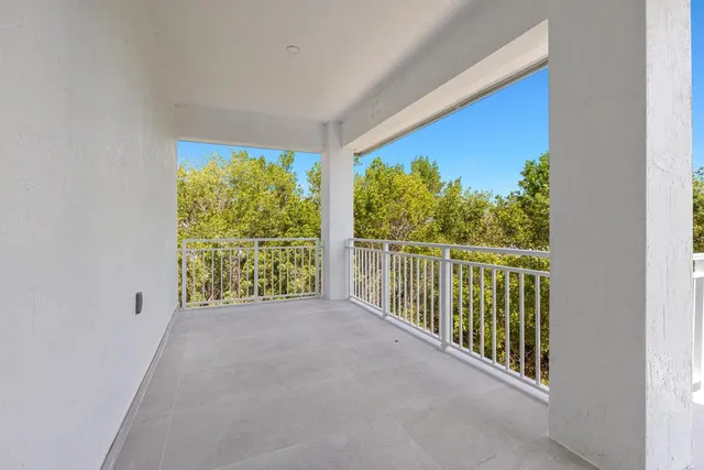 a view of a room with a large window