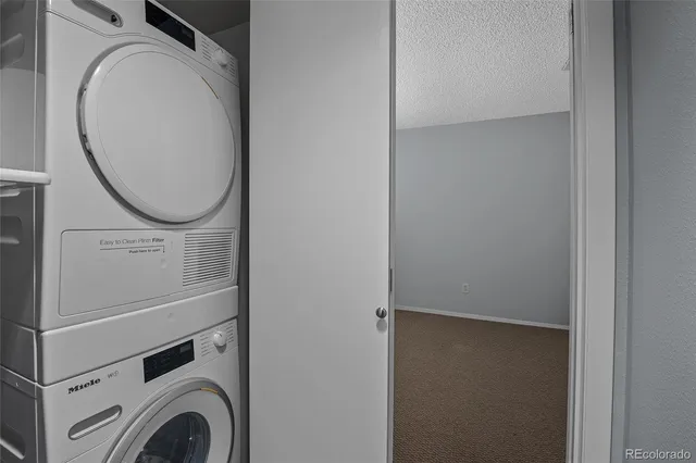a view of a swimming pool with an outdoor space and seating area