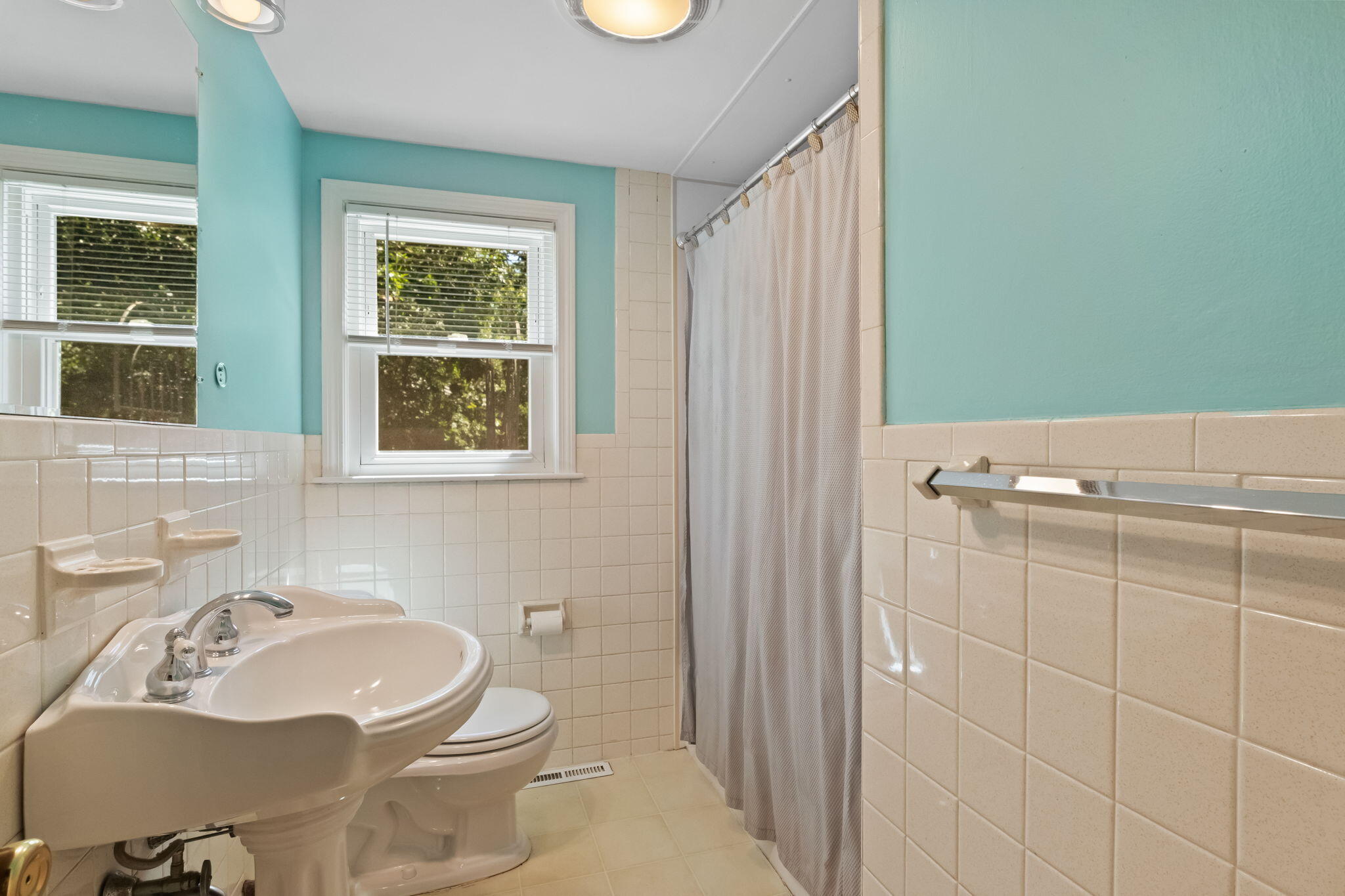 49 Russells Path Brewster, MA 02631 - Photo 19 of 37 a bathroom with a sink toilet and shower