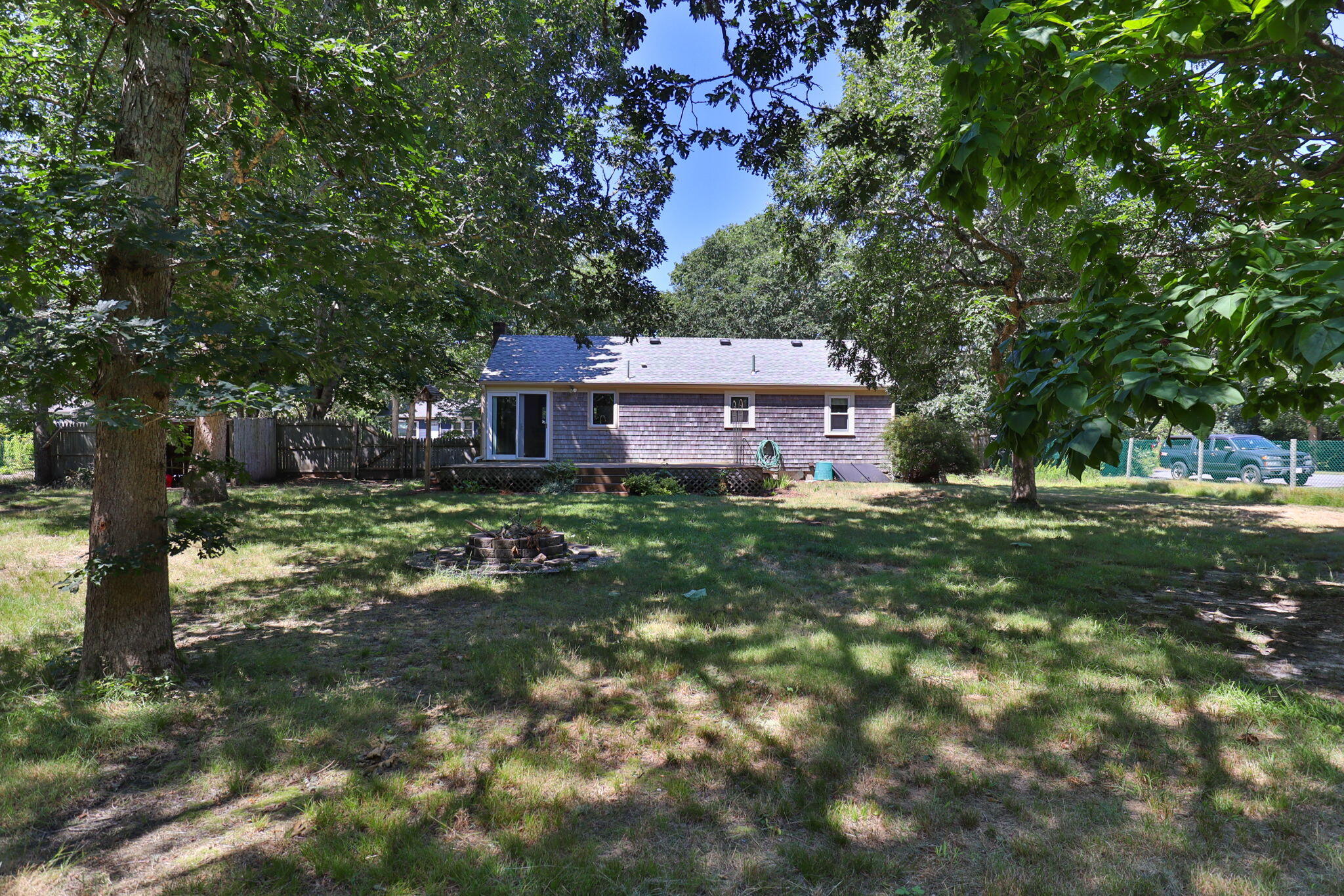 49 Russells Path Brewster, MA 02631 - Photo 30 of 37 a house in middle of forest