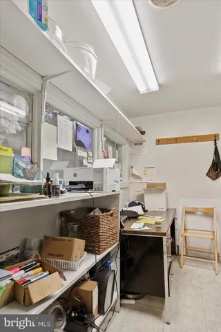 a room with lots of counter space and windows