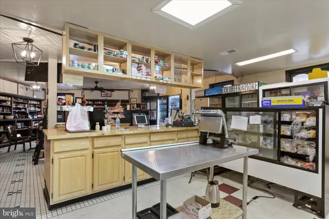 a room with lots of different kinds of flowers