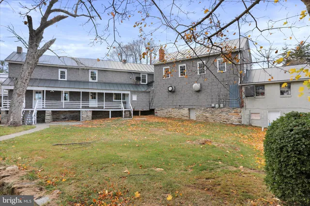 a view of swimming pool with seating space