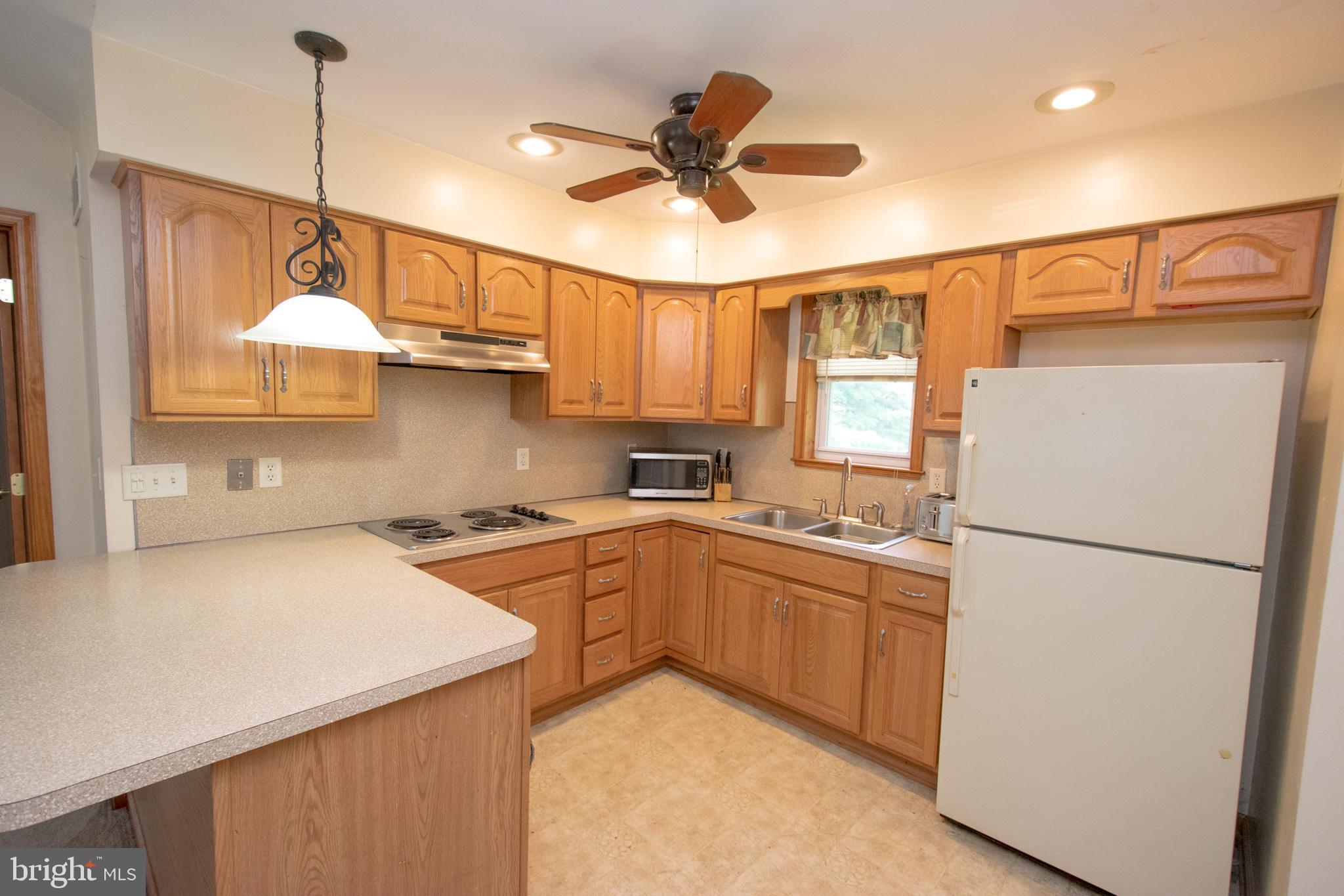 2402 Larkin Road Boothwyn, PA 19061 - Photo 17 of 36 In-law suite kitchen