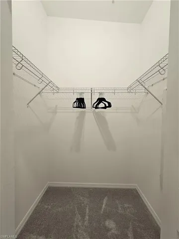 a room with furniture and a couch