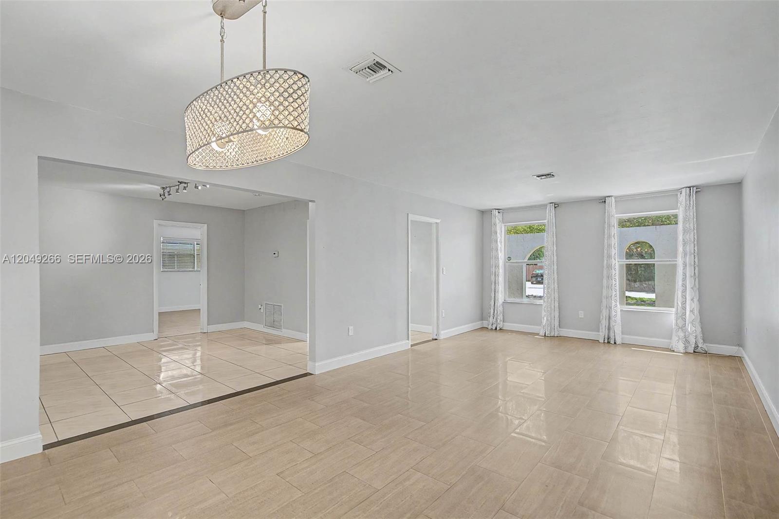 11860 Southwest 81st Road, Unit 11860 Pinecrest, FL 33156 - Photo 6 of 24 Dining/Living/Family