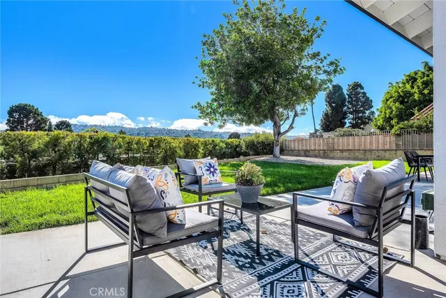 a yard with table and a chairs