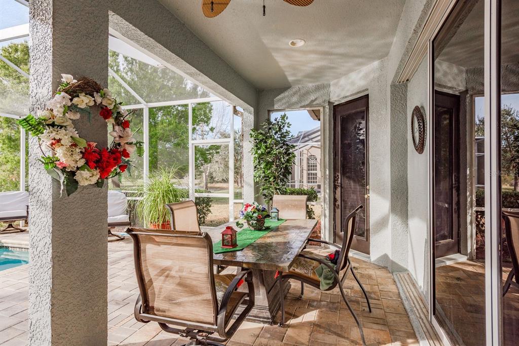19216 Inlet Cove Court Lutz, FL 33558 - Photo 20 of 41 a dining room with furniture and window
