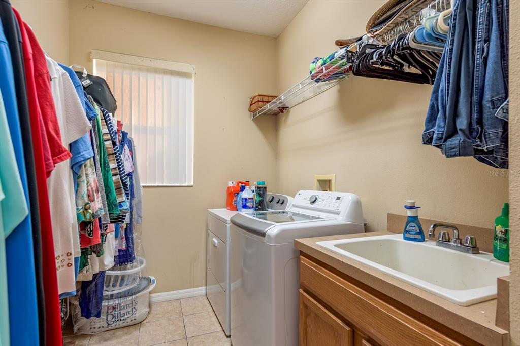 19216 Inlet Cove Court Lutz, FL 33558 - Photo 23 of 41 a utility room with dryer and washer