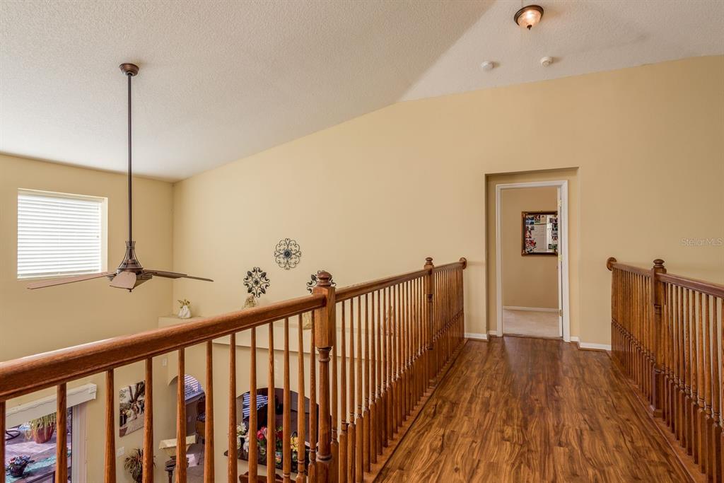 19216 Inlet Cove Court Lutz, FL 33558 - Photo 26 of 41 a view of hallway with wooden floor