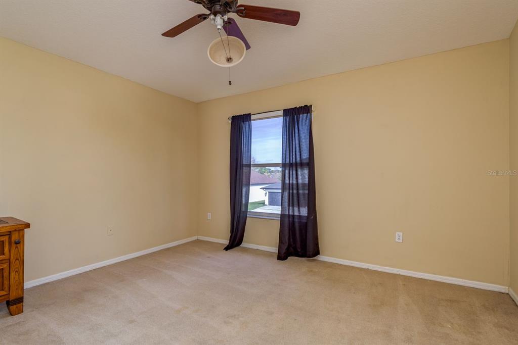 19216 Inlet Cove Court Lutz, FL 33558 - Photo 29 of 41 a view of an empty room with a window
