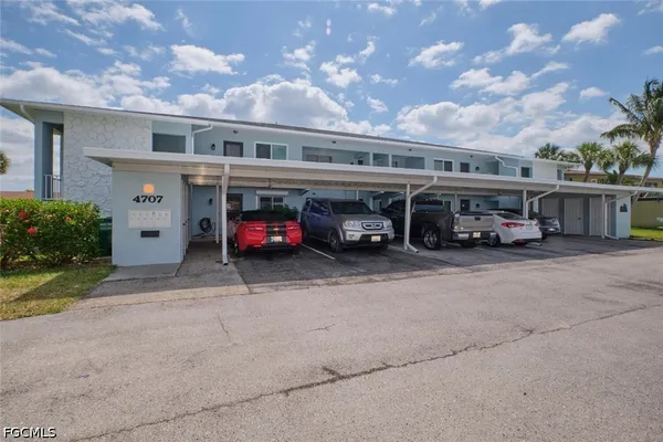 a car parked in front of a building